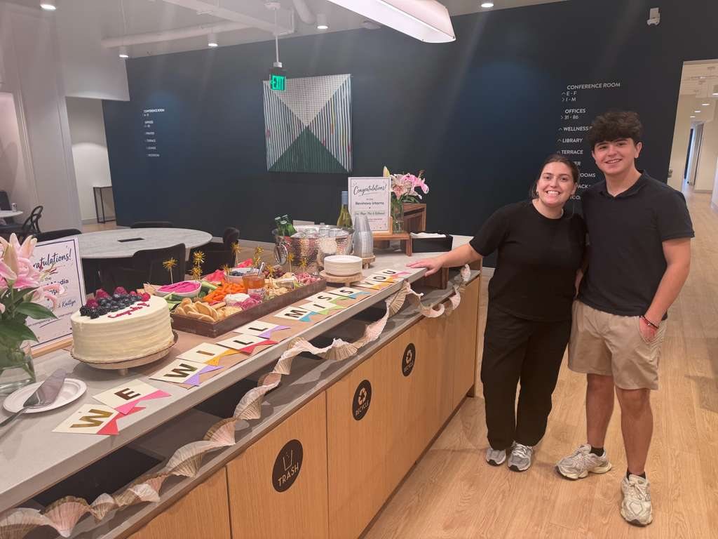 Max with a colleague at the Revinova intern celebration